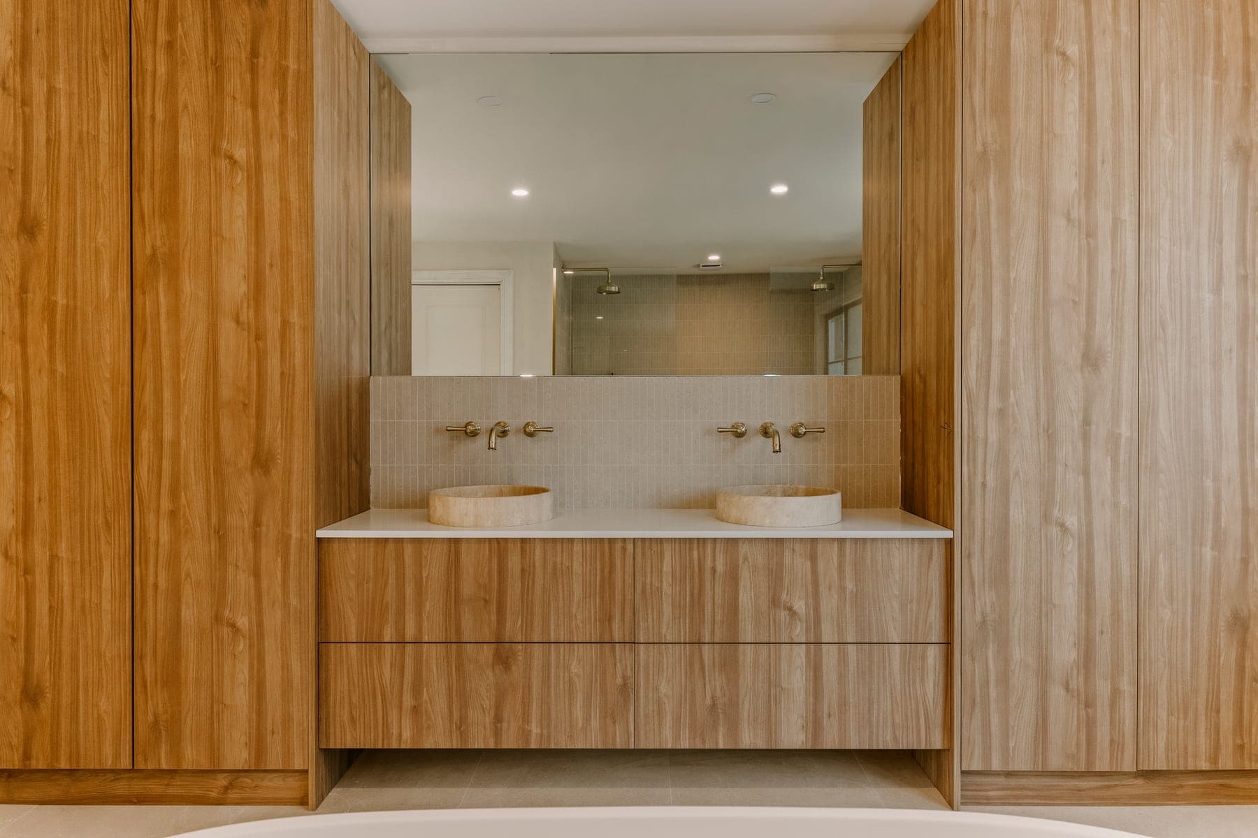 Renovated open plan kitchen and living space in a Gold Coast family home, finished by All Leonard Build.